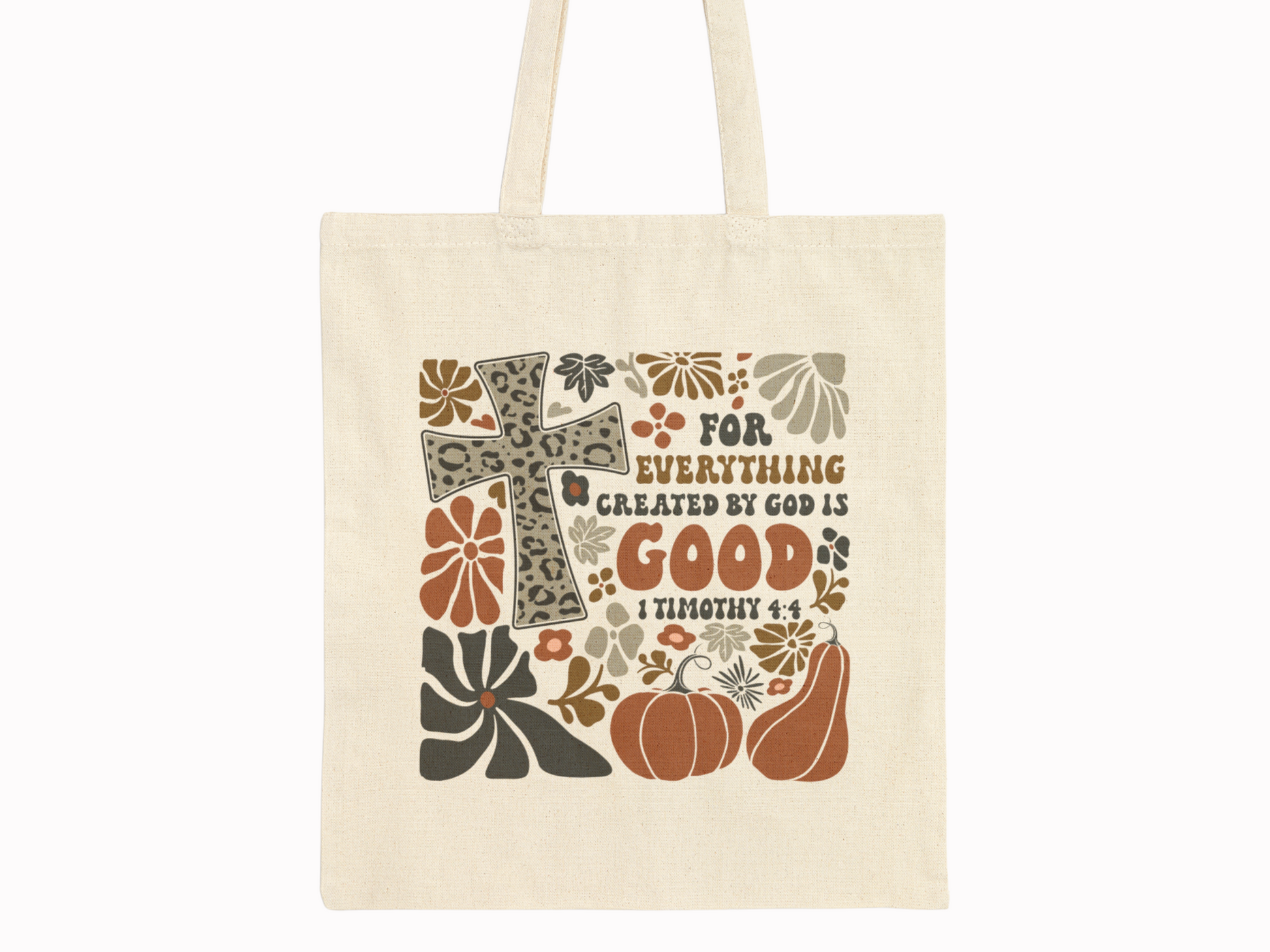 Tote bag with cross and pumpkins design on a white background